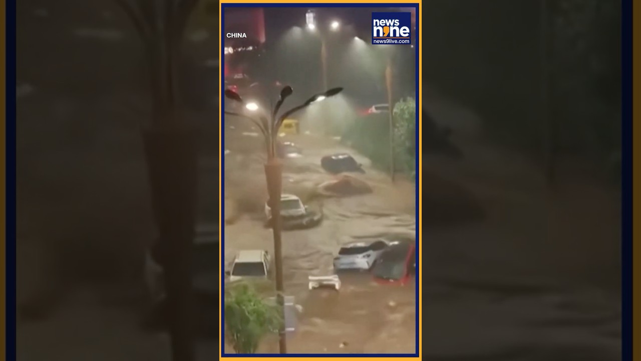 China Floods : Floodwaters carry vehicles away in China's Chengde