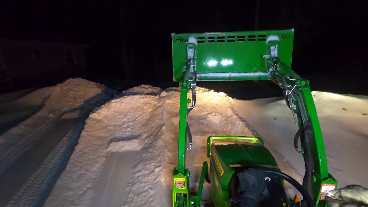 Snow Removal with 60&rdquo; Bucket and Edge Tamers!