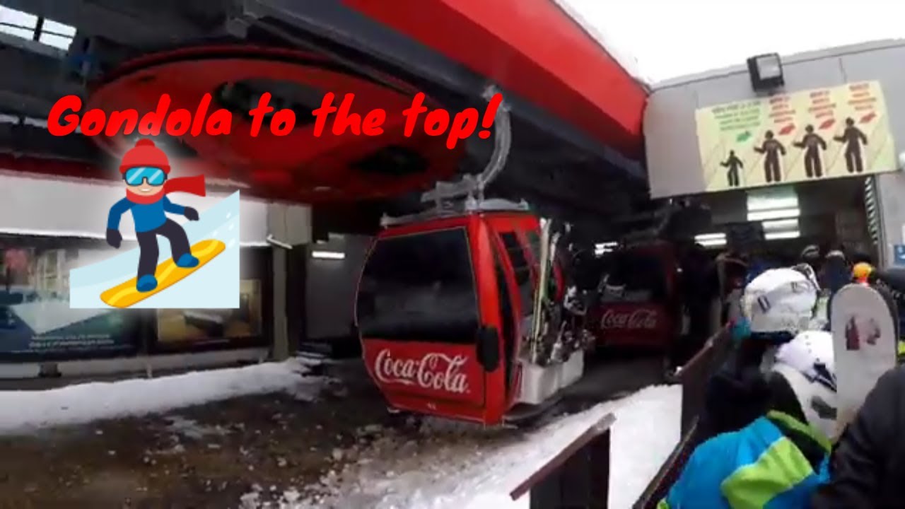 Gondola ride to the top of the mountains - ready, set, wait for the kids to pass.... snowboarding!