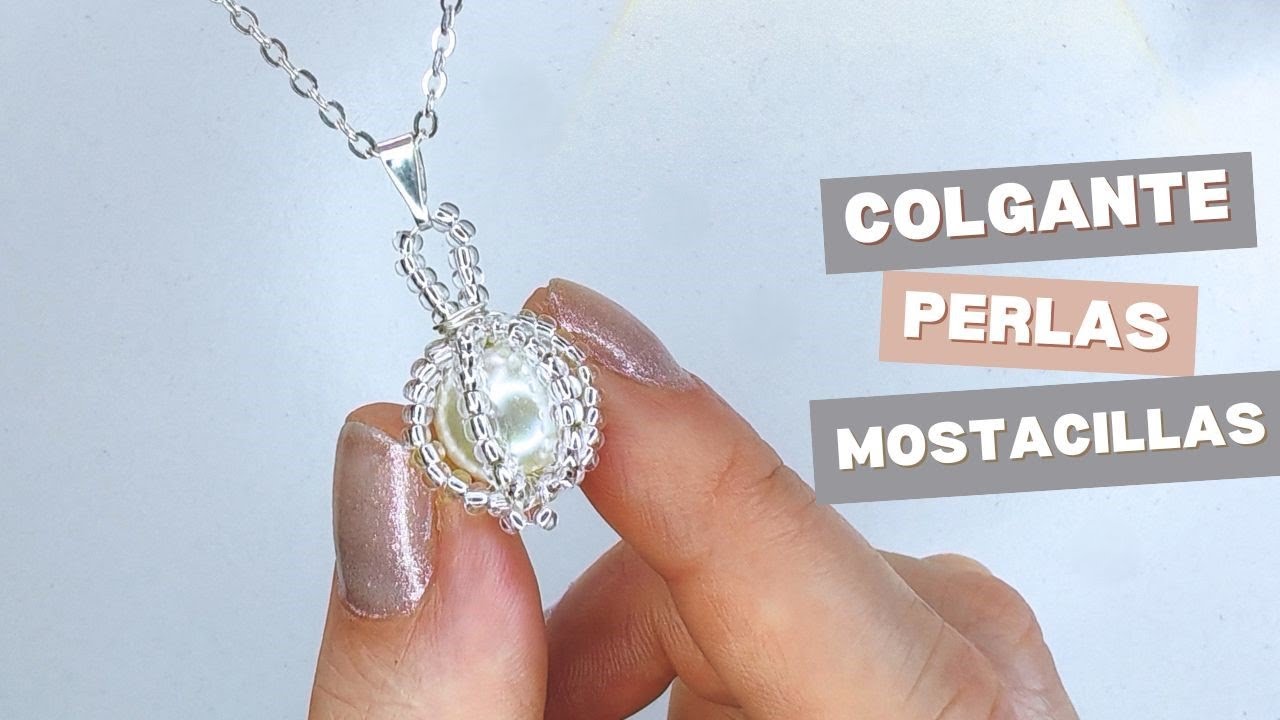 COLGANTE DE PERLA ENVUELTA EN MOSTACILLAS
