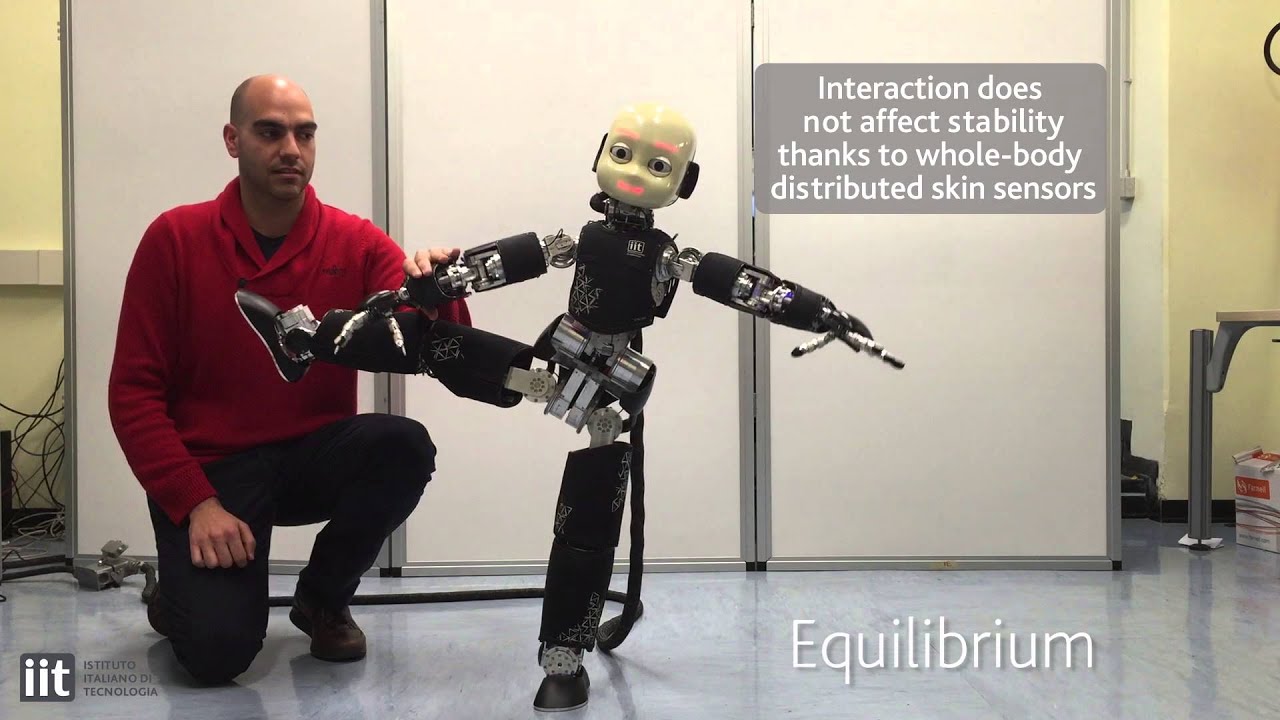 iCub balancing on one foot while interacting with humans