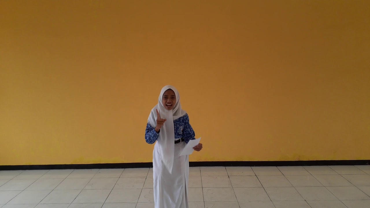 KOMNASLISCA2020-PUISI-GURU & PERJUANGANNYA_APRILIA PUTRI JANUA DEWI_SMP NASIONAL MALANG