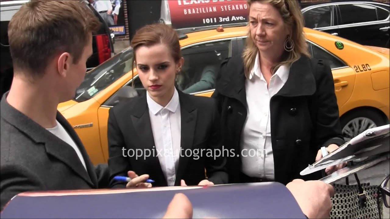 Emma Watson - Signing Autographs at the 
