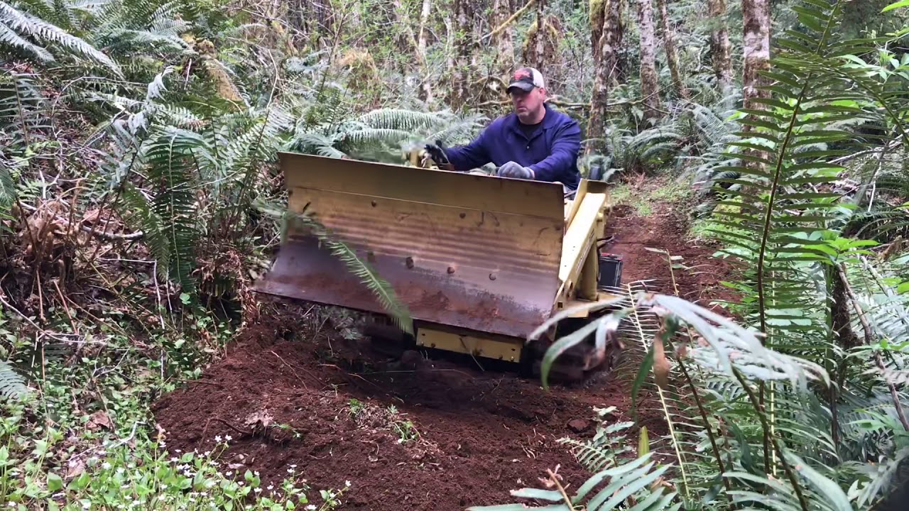 Magnatrac mini dozer trail building