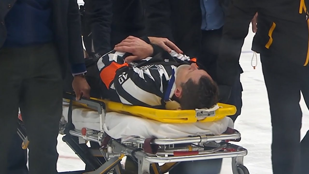 Referee Steve Kozari Injured in Collision at Bolts/Pens