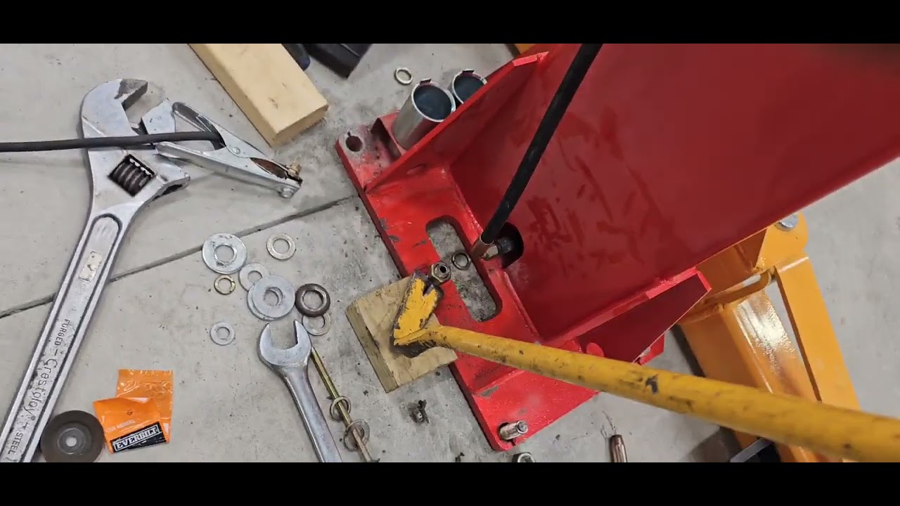 how to remove pin anchors from concrete for a two-post lift