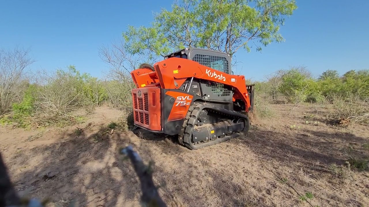 Kubota SVL75 skidsteer, South Texas tree  grubbing, and tackling a 9
