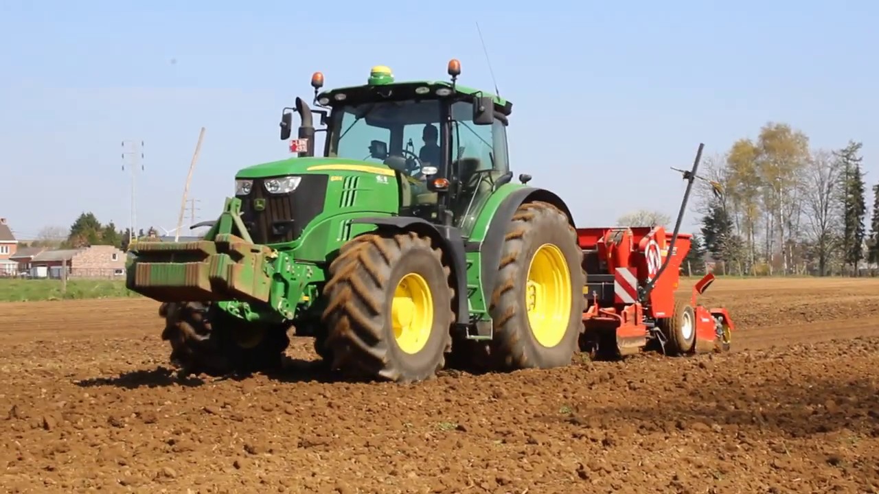 John Deere 6210R met Miedema CP42 - Kuhn HR3002