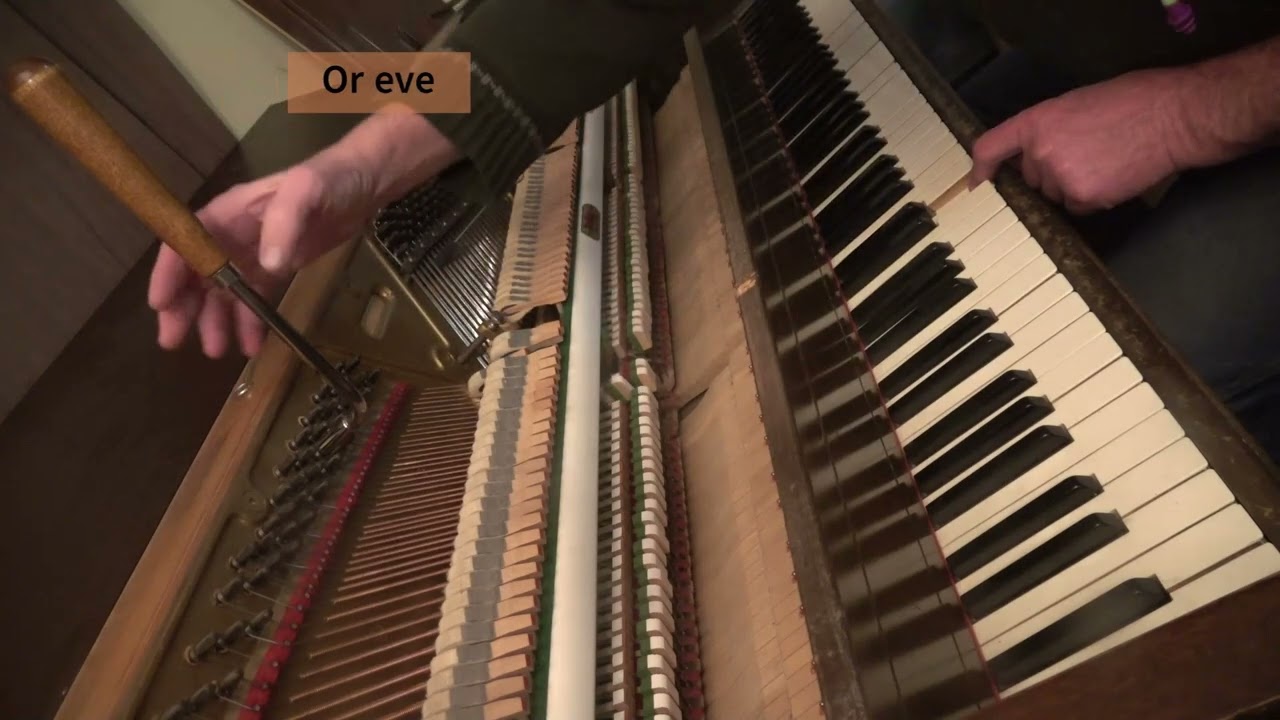 Tuning a piano by ear.