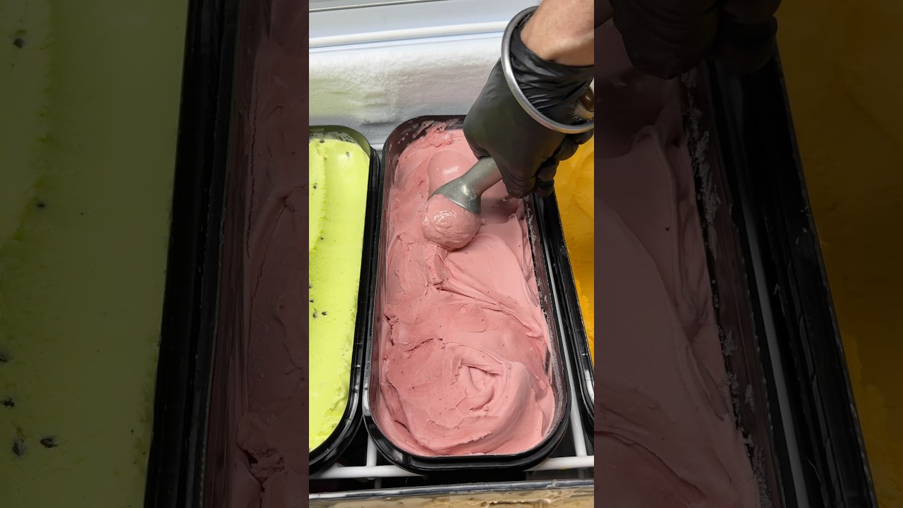 Strawberry ice cream scoop on a waffle cone #dessertlovers #gelato #foodie #tasty #youtubeshorts