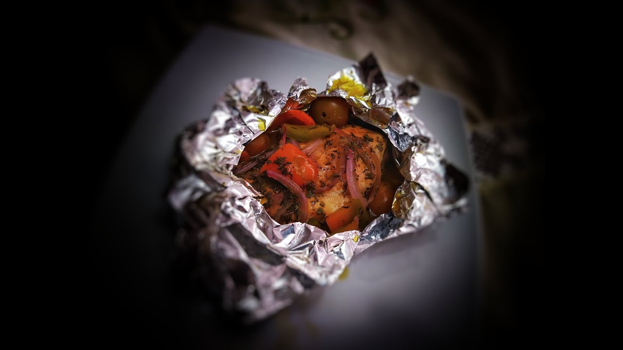 Pechuga de Pollo en Papillote con naranja y miel.