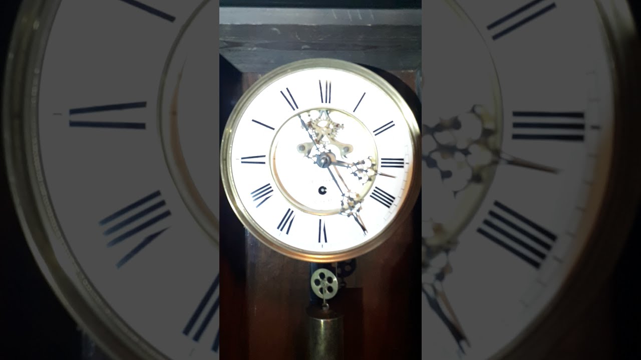 Vienna regulator clock with visible escapment on the dial