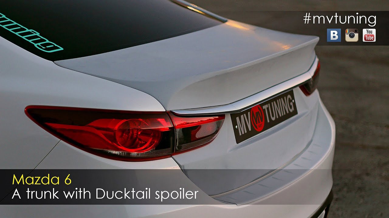 A trunk with Ducktail Spoiler for Mazda 6. Fitting before painting.