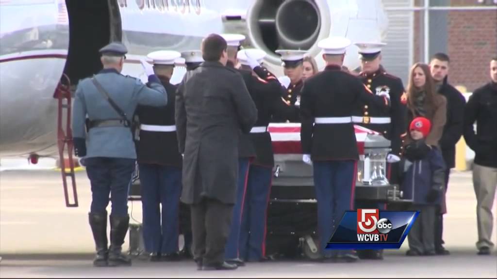 Hundreds line route as fallen Marine returns home