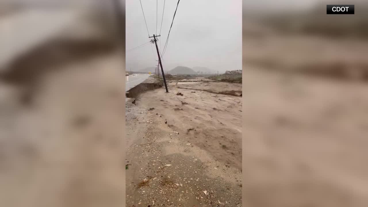 Floodwaters close roads in San Bernardino County, California