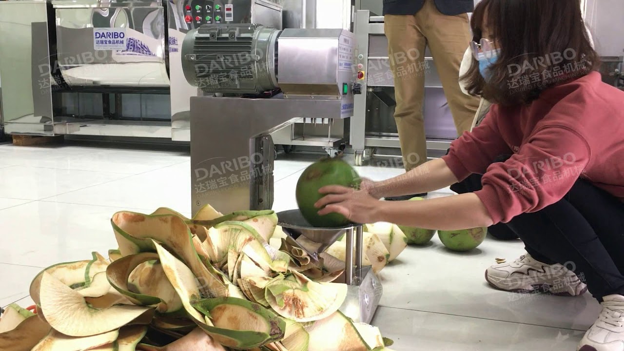 Coconut Peeling Machine:It just peels 9 consecutive coconut,operated by a single lady(Amazing)