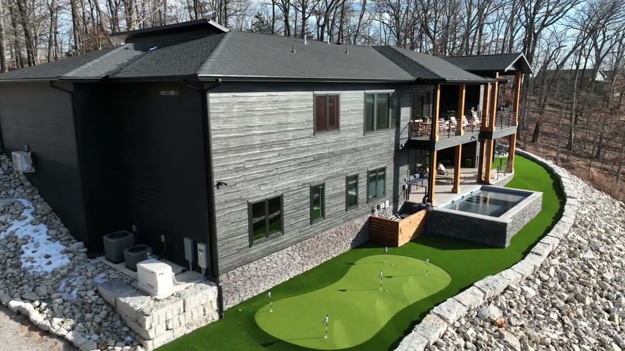 Gorgeous New Lake Front Home with a Pool and Dock Slip!