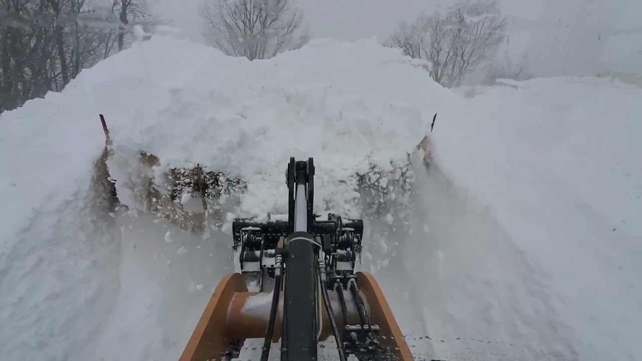 Snow plowing white a big blade of snow/ Metal Pless live Edge 2025-02-13