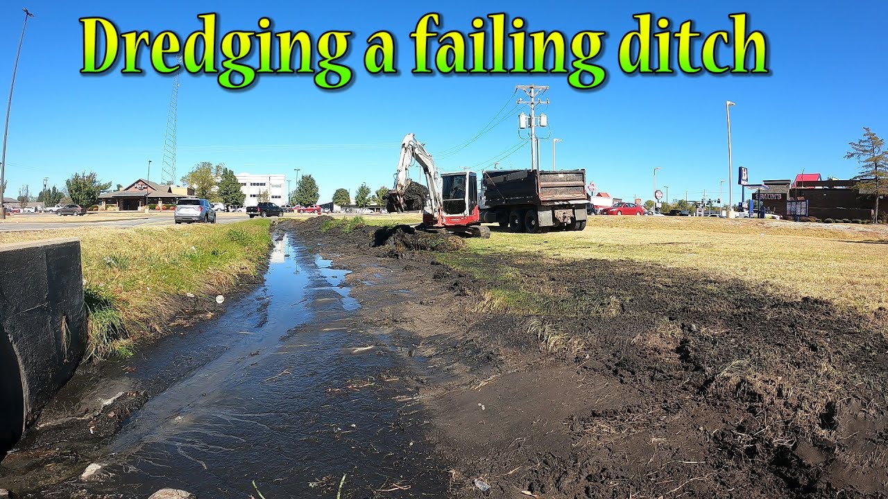 Dredging A Silted In Ditch