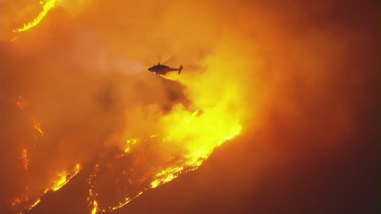 Crews battle growing brush fire in Sepulveda Pass off 405 Freeway in L.A.