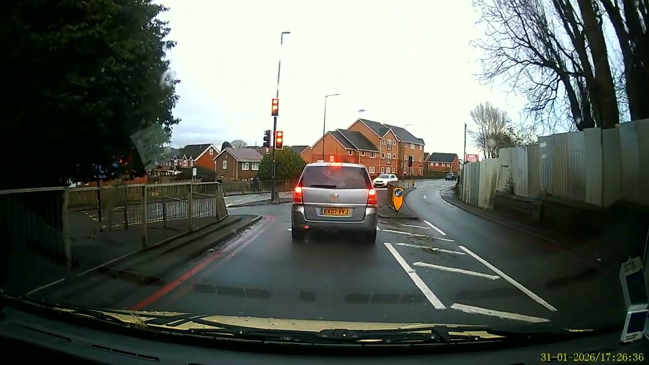 Freshie moron steaming through a red light , regular occurrence 
