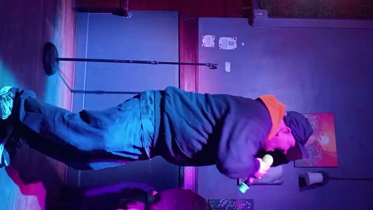 Gino singing and rapping to Soul Survivor at karaoke.