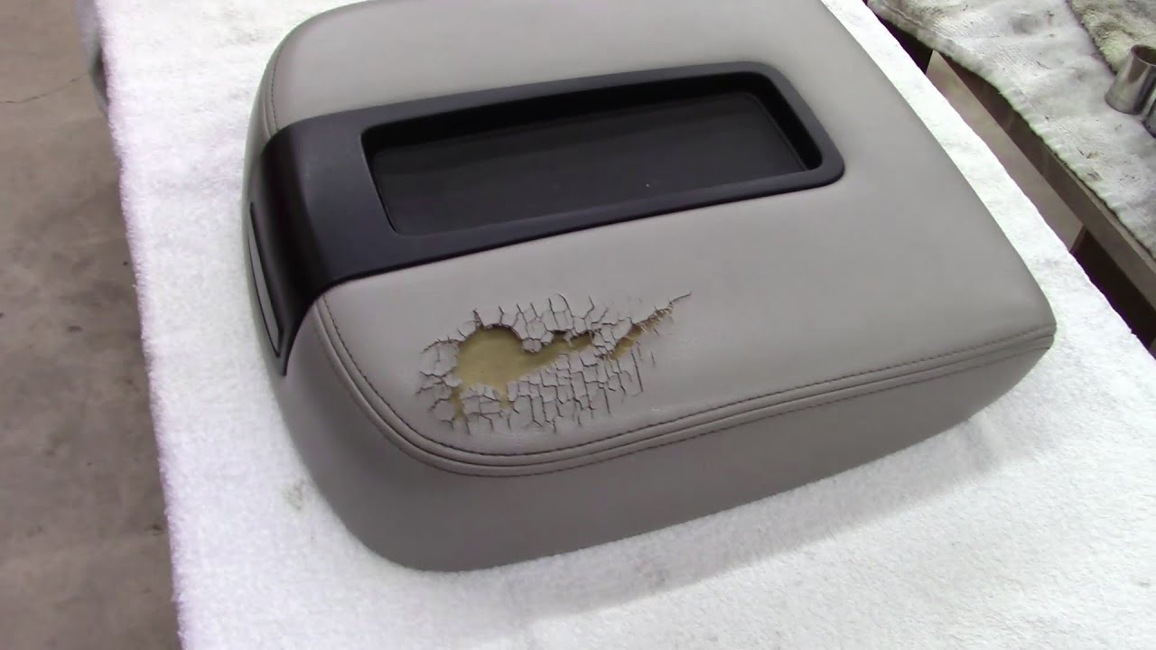 Reupholster center console on 2007 Tahoe.