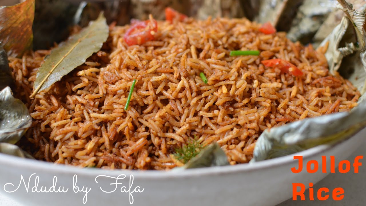 Jollof Rice Cooked in Banana Leaves / Ndudu by Fafa