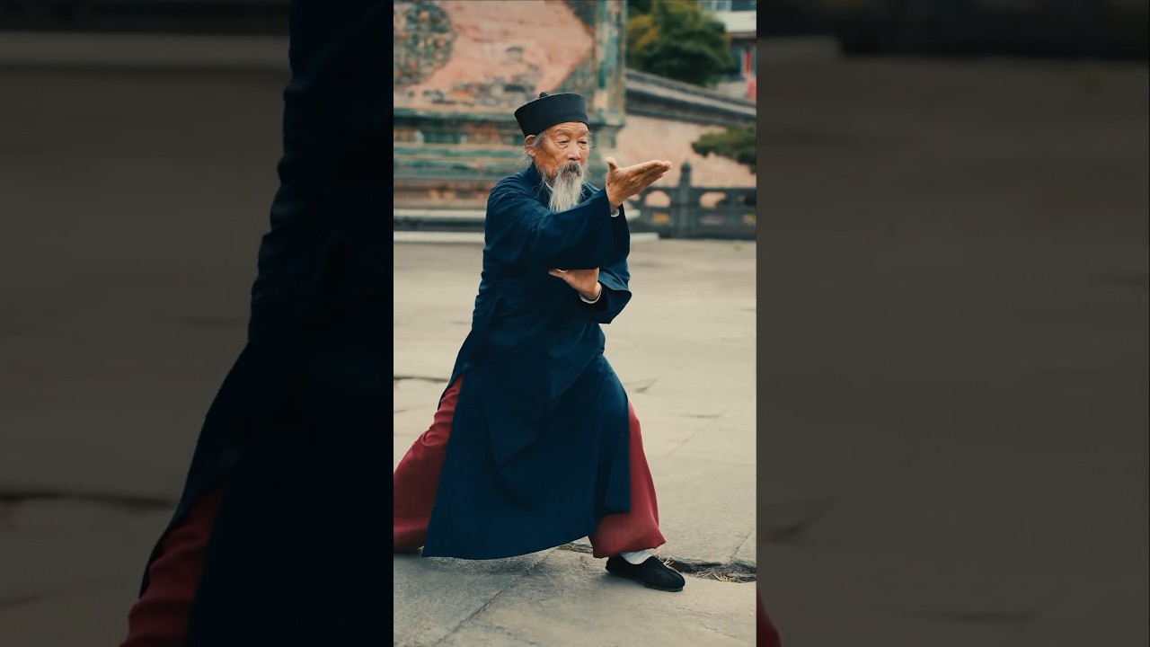 Over 80 years old Taoist master playing Taichi.
