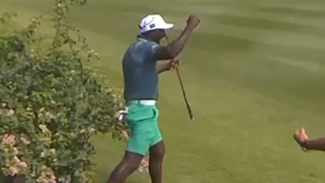 ‘A miracle’ – Watch Man Utd legend hole incredible golf shot from behind bushes in celeb clash with
