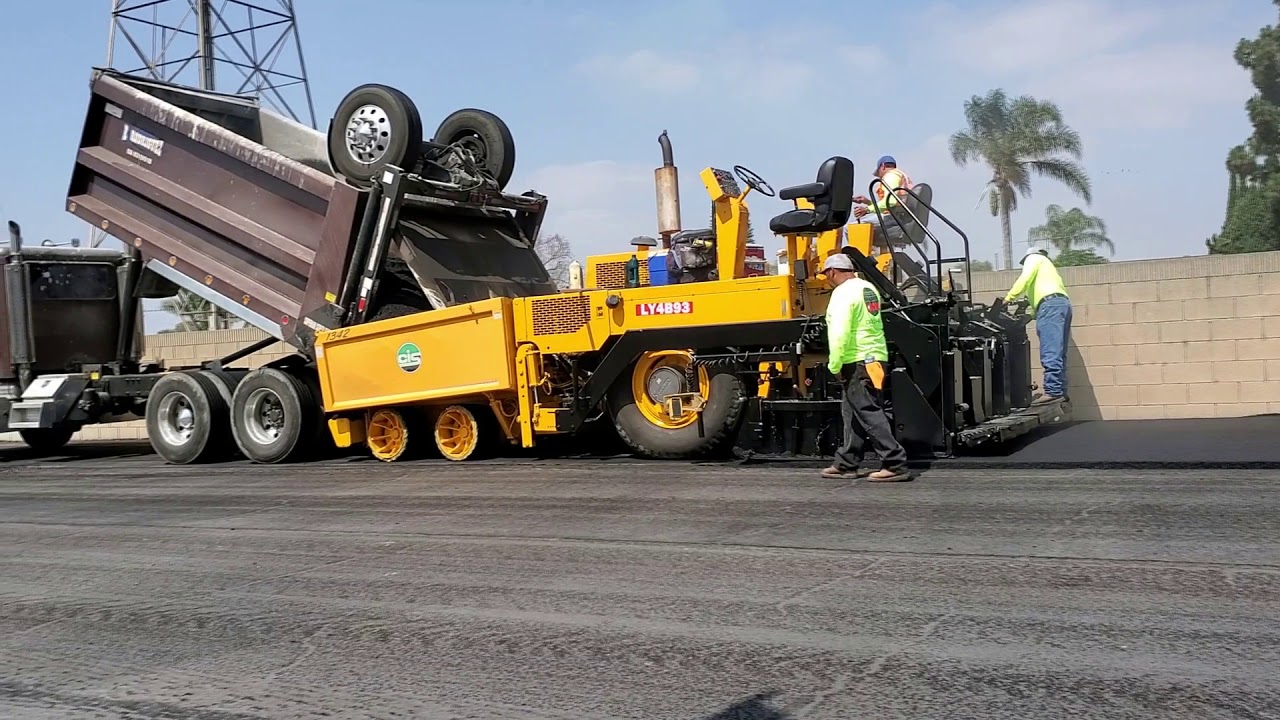 Paving the road in our Mobile home park.
