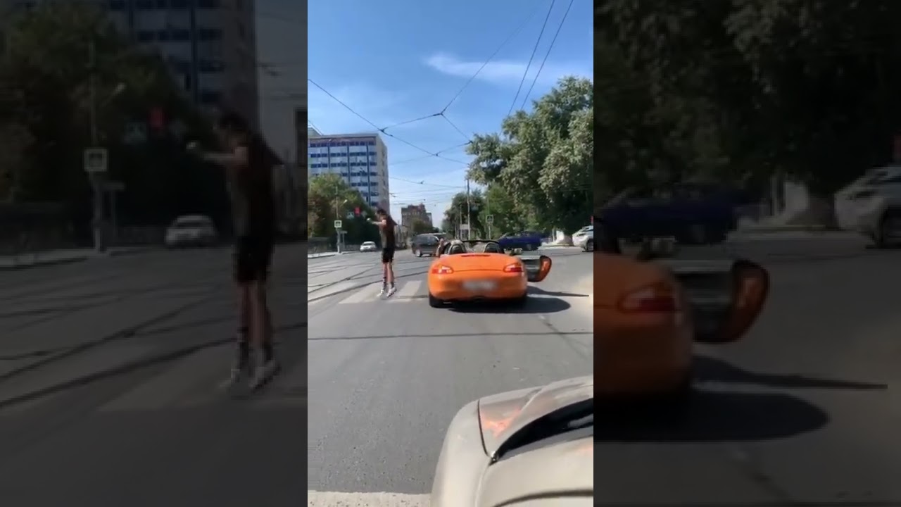 Dude Doesn't Let Car In Crosswalk Stop Him