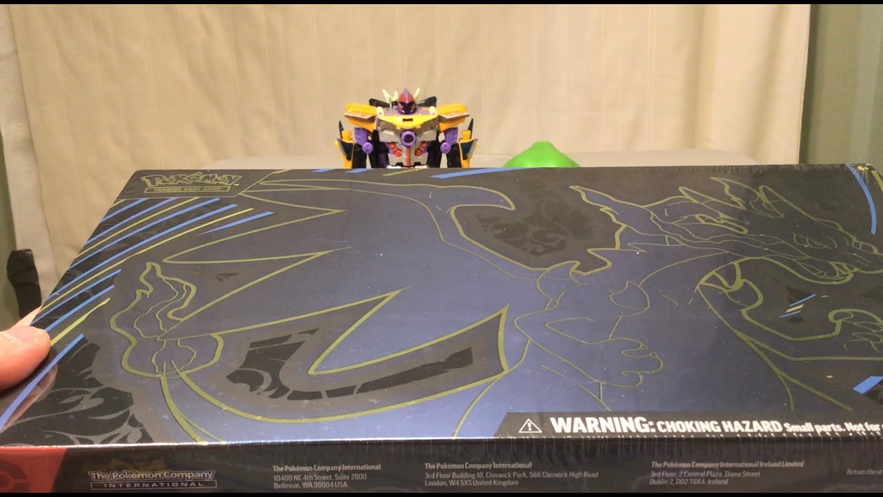 Opening a Mega Charizard X ex Ultra Premium Collection Box!