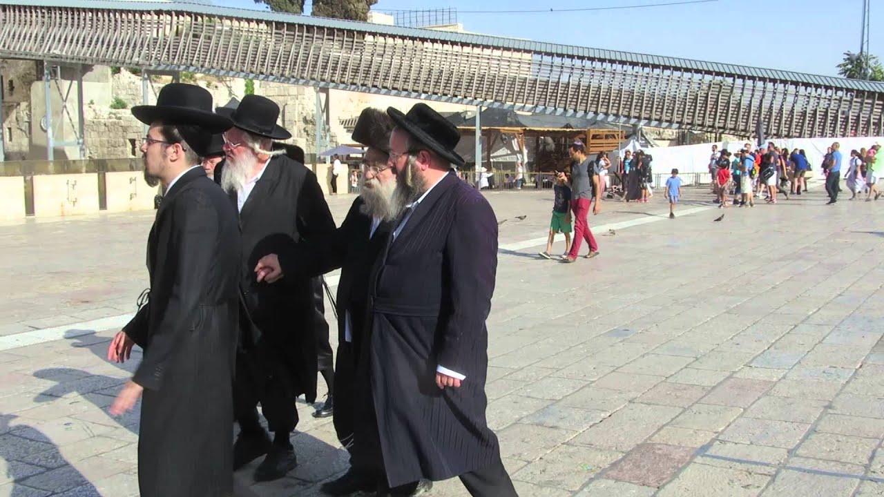 The rabbi and his followers in the Western Wall plaza Jerusalem Israel