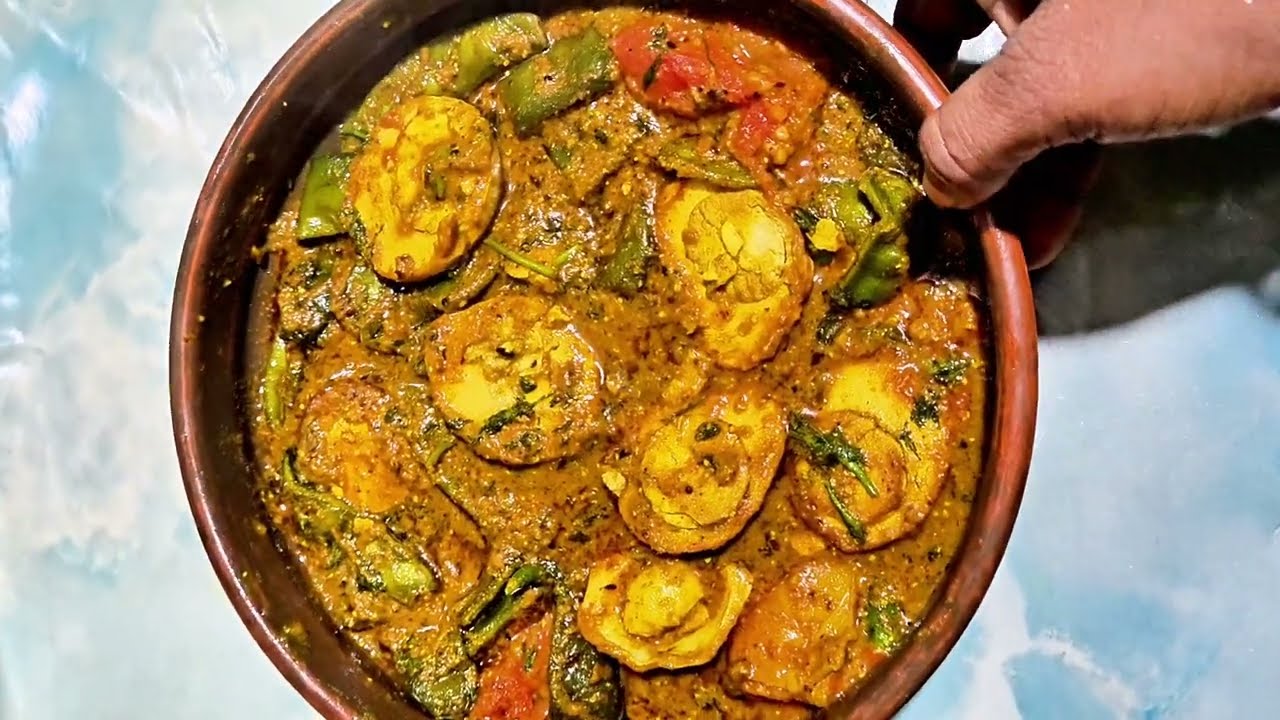 সিম, টমাটো, বেগুন, ও সেদ্ধ ডিম রান্না।