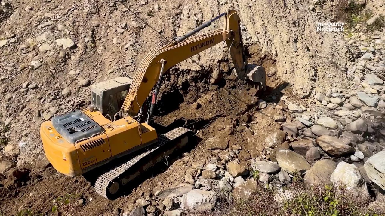 Master Excavator Operator Restoring Riverside Road After Monsoon Damage