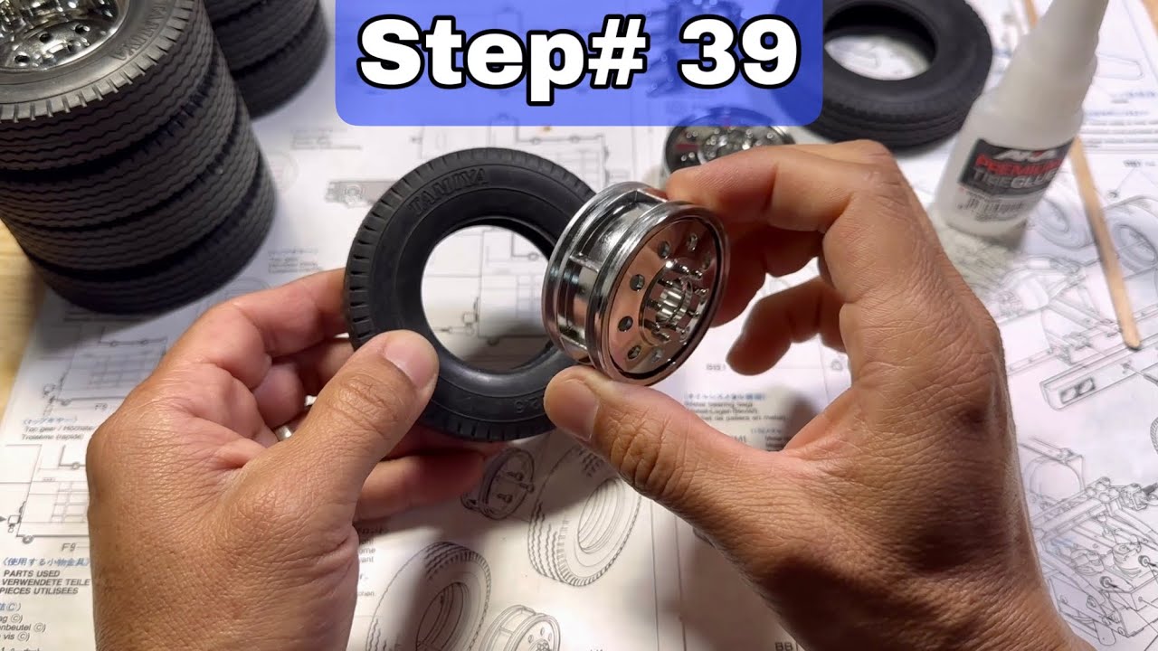 How to build rc Tamiya globe liner truck 1:14 scale, step 39 putting together the rims with tires