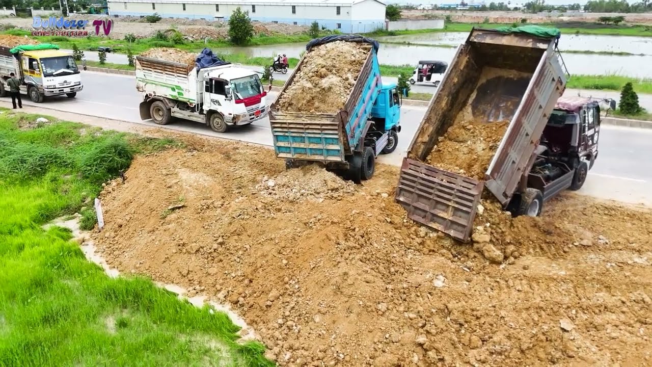 First Opening Filling Up The Low Land Next To Narion Road By Bulldozer And Dump Trucks Team Work