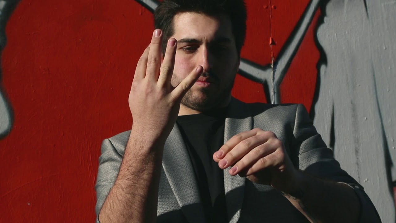 Circulus | Borrowed Ring Through Fingers by Myles Thornton