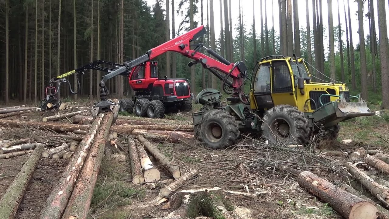 Новый Komatsu 931 и трелевочный трактор LKT