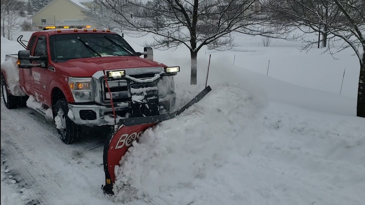 Plowing a Residential Driveway  With a 9'2