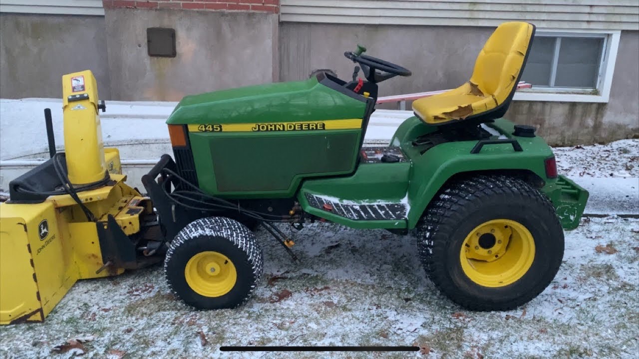 Найти садовый трактор John Deere 445