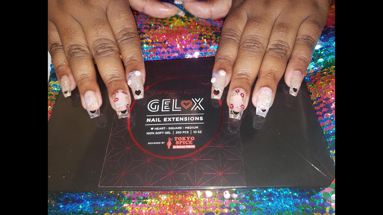 Valentine's day set using Gel x heart cut out nails by Britney Tokyo