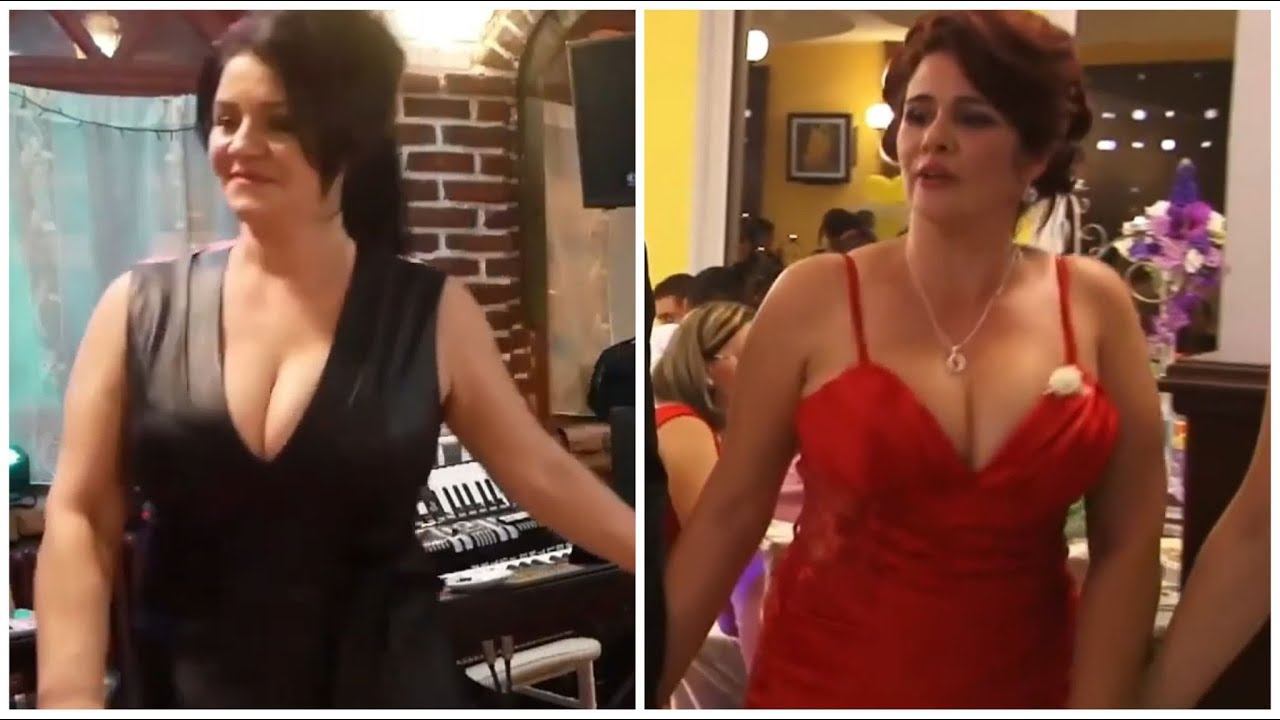 HUGE BOOBS BOUNCING 40 - Busty milf in leather dress (the return) VS big boobs milf in red dress.