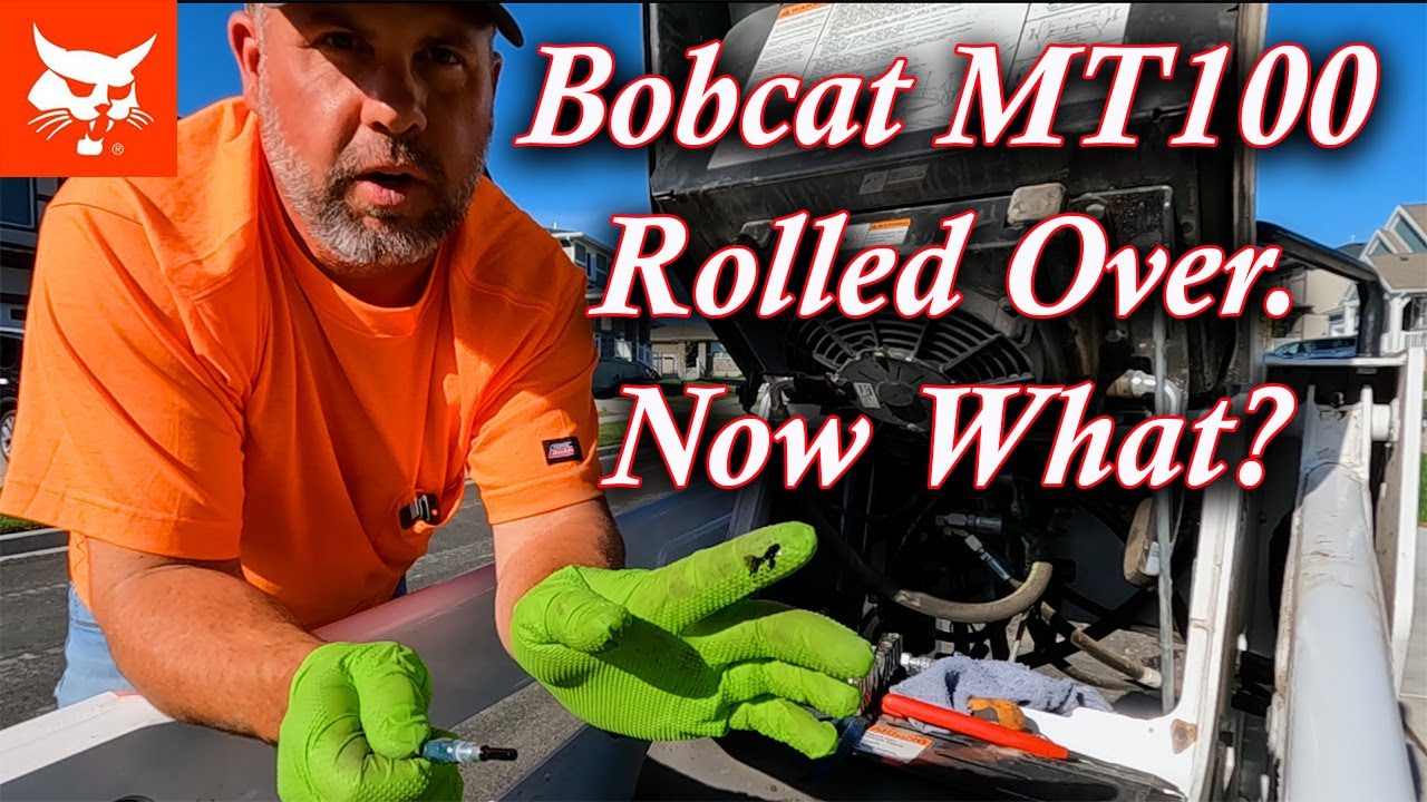 Bobcat MT100 перевернулся на бок. Что делать?