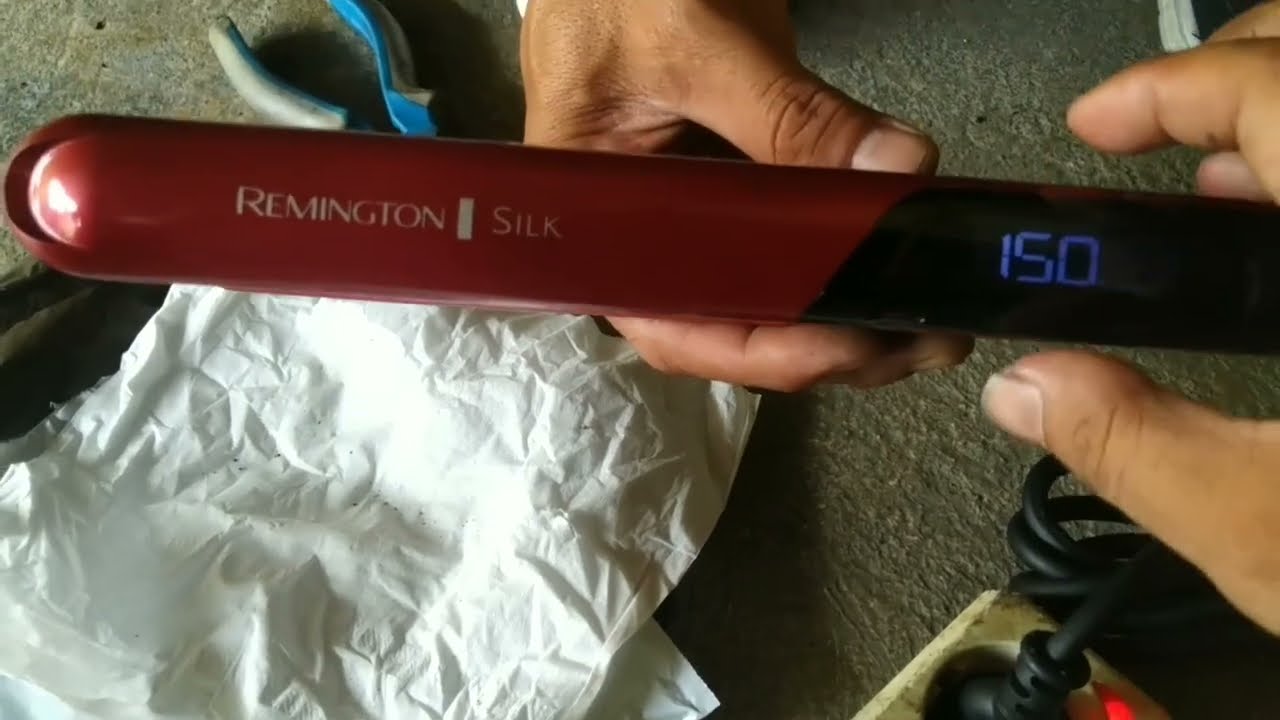 proses pemasangan kabel catokan rambut merk Remington silk