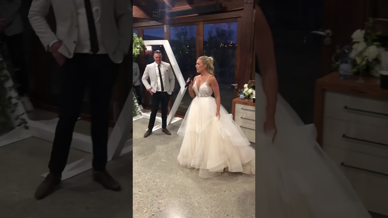 Bride sings her own version of Taylor Swift’s “Love Story” to her Groom at their wedding