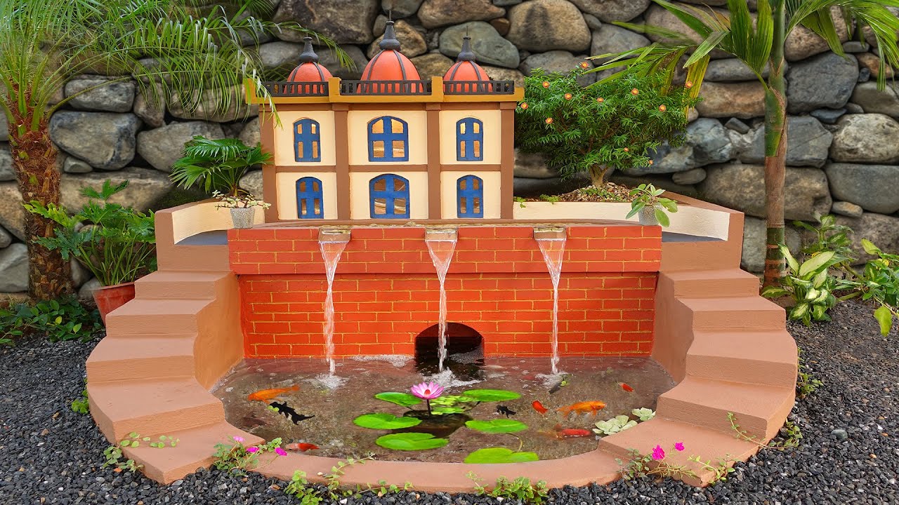 An incredible idea! DIY palace waterfall aquarium from cement