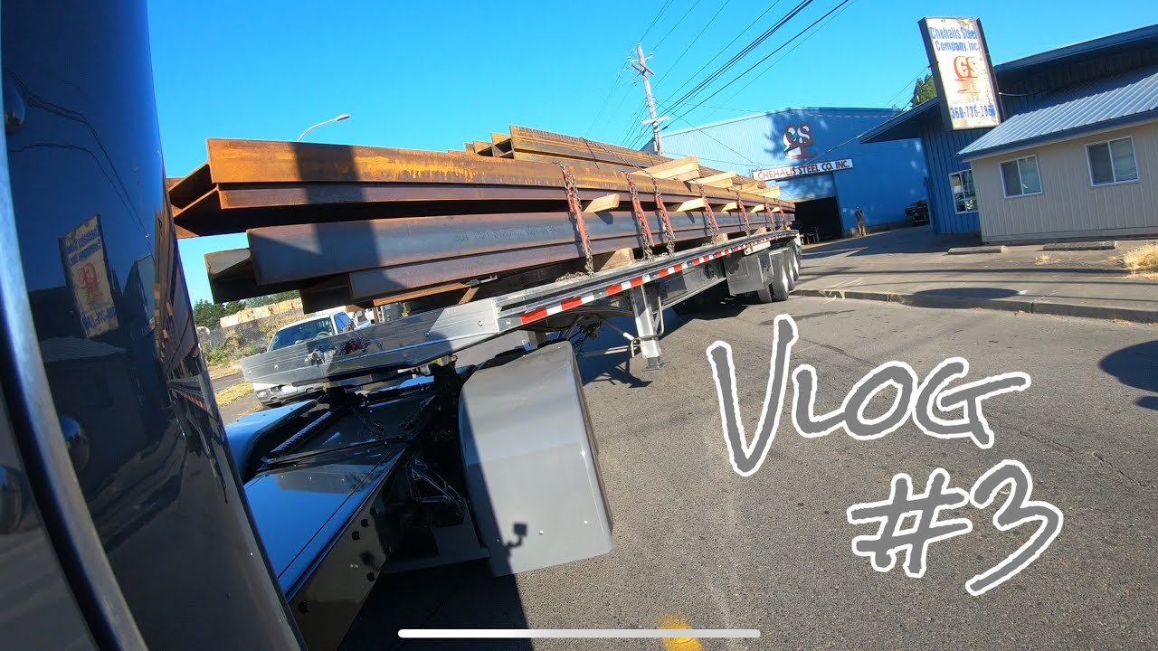 Vlog #3 stretched Peterbilt backing off street hauling long steel beams