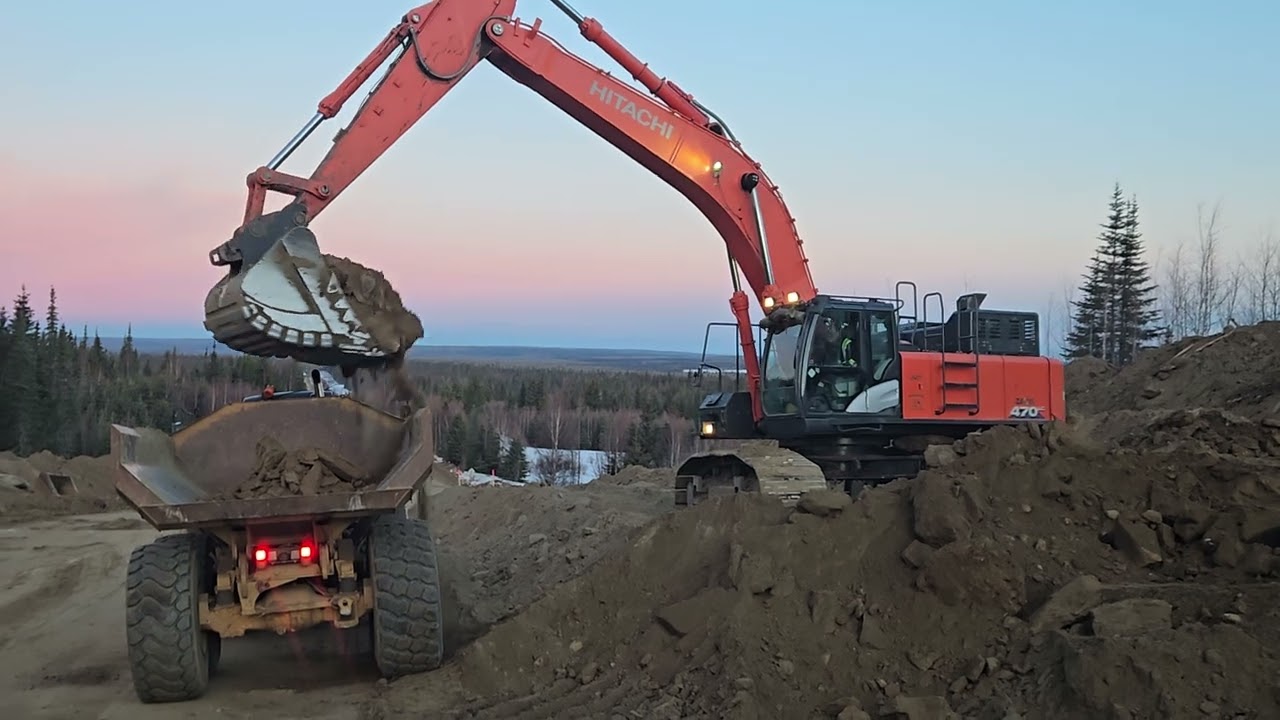Road building loading rock trucks